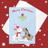 Bunnies are kissing under the mistletoe Greeting card